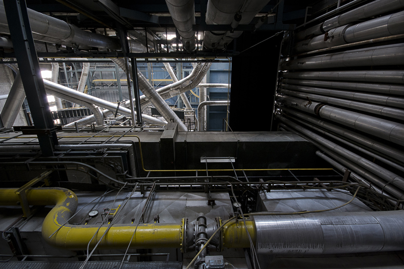 Steam pipes running above us.